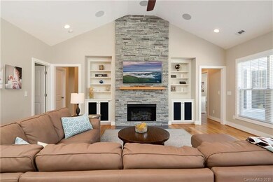 Gas fireplace, surround sound speakers throughout.