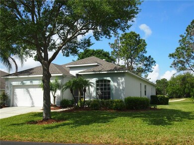 Large side and view to golf course in back of home