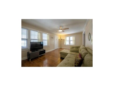 Beautiful hardwoods in spacious living room.