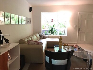LIVING AREA AND ENTRANCE WITH IMPACT WINDOW