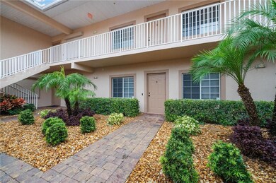 Entrance to property with a balcony