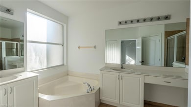 Bathroom with plenty of natural light, a shower st