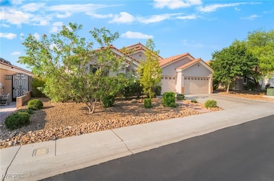 Mediterranean / spanish-style house with driveway,