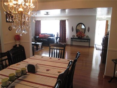The dining area is adjacent to the living space, p
