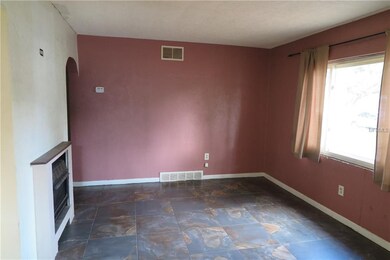 Living Room is actually a pretty good size at 11' 