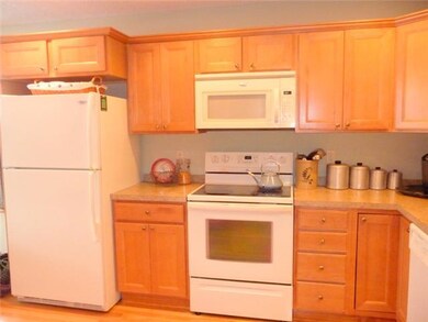 Kitchen kitchen with gleaming hardwood floors