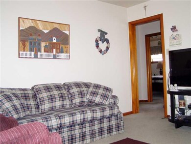Den. TV room located off the kitchen. Could be thi