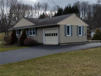 Front/side view with garage