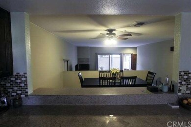 View from the kitchen of the dining area, living r