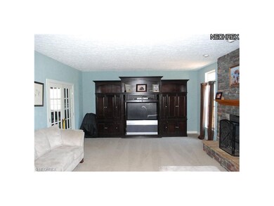 Spacious family room.  Entertainment center stays 