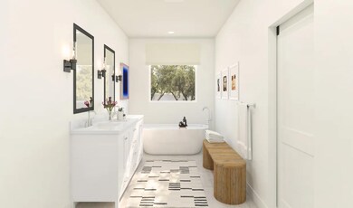 Primary bath with freestanding tub and glass shower enclosure