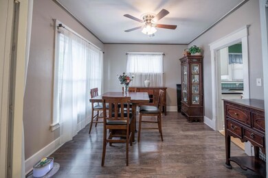 Dining room has laminate flooring