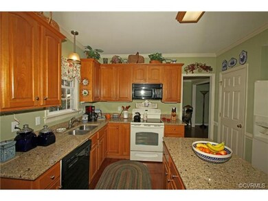 Beautiful kitchen with granite countertops, pantry