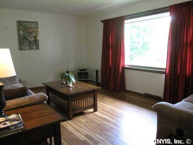 Living Room. Light and bright - the hardwoods glea