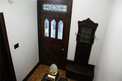 Front entry with original details.
