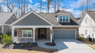 View of front of house with an attached garage, st