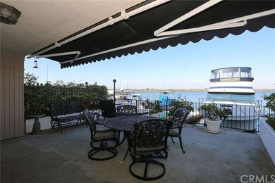 A retractable electric awning makes the waterfront