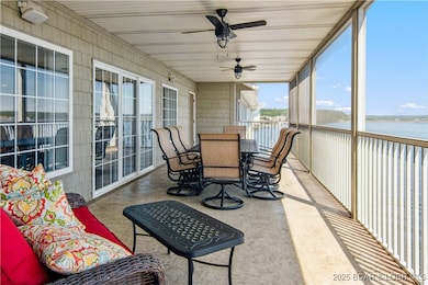 Expansive screened-in deck complete with a storage