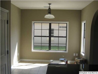 Eating area adjoining Kitchen with tile flooring