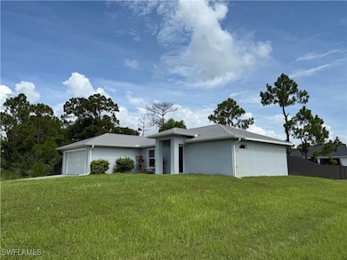 View of front of home featuring an attached garage