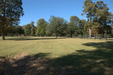large turnout with three board fencing