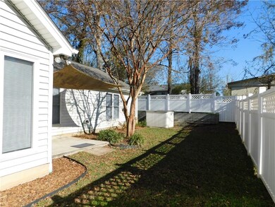 Side yard with room for the kids and/or pets. Smal