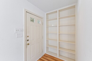 A closer look at the entry and built in shelves!