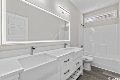 Featuring Beautiful Double Vanity and Smart Mirror