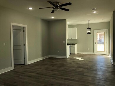 living area to kitchen