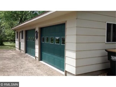 The oversized 2 car garage has 220 service and is 