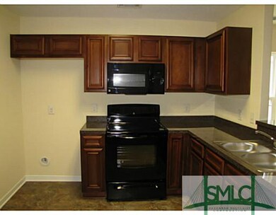 Kitchen. Standard black appliances; does not inclu