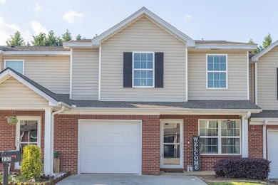 Multi unit property with driveway, roof with shing
