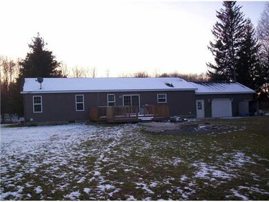 Exterior Back. note overhead garage door in rear o