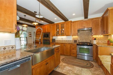 Large kitchen with granite counter...