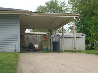 Back carports and storage shed