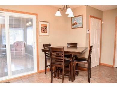 Dinette with tile flooring.