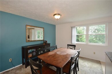 The dining room is spacious and bright with easy a