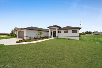 1102 Santa Barbara Blvd N, Cape Coral, FL 33993 - photo 2