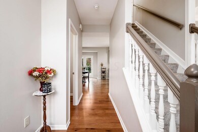 Stylish Foyer with Gleaming Wood Floors