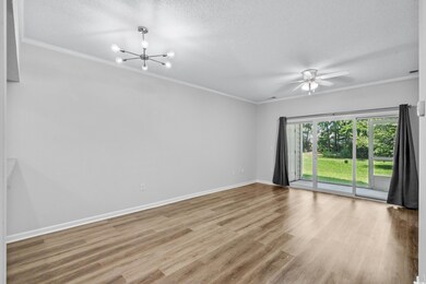 Empty room featuring ceiling fan with notable chan