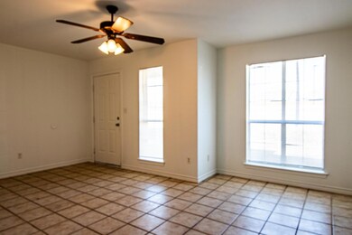 Tiled entryway with ceiling fan