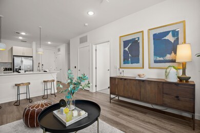 Living area featuring wood finished floors and re