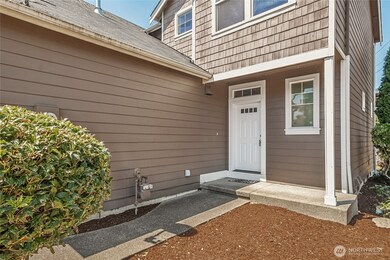 Covered porches provide shelter at the entry for guests or deliveries.