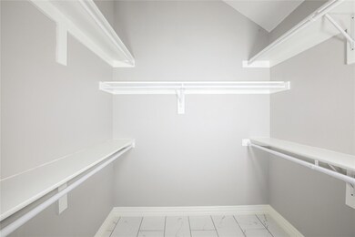 Your large walk-in closet fit for two!