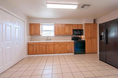 Kitchen.  Utility Area with Washer & Dryer be hide