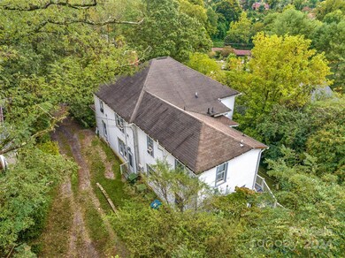 Looking at property from right side off driveway entrance