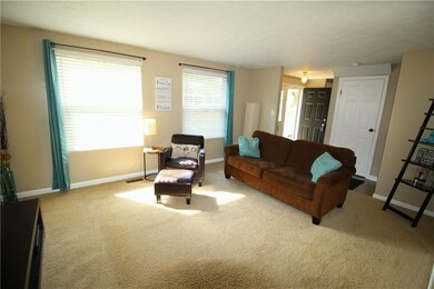 Another view of the living room open to the entry.