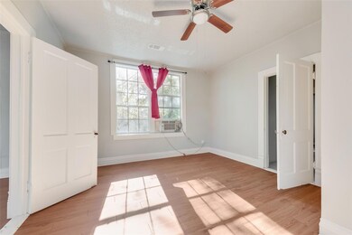Unfurnished bedroom with ceiling fan, light hardwood / wood-style flooring, and a textured ceiling