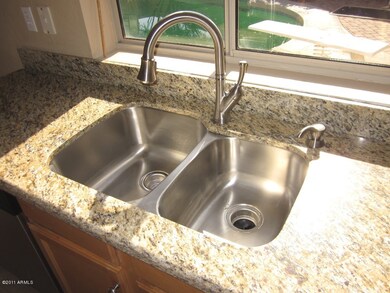 New granite, sink, and faucet