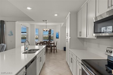 Kitchen featuring stainless steel appliances, sink